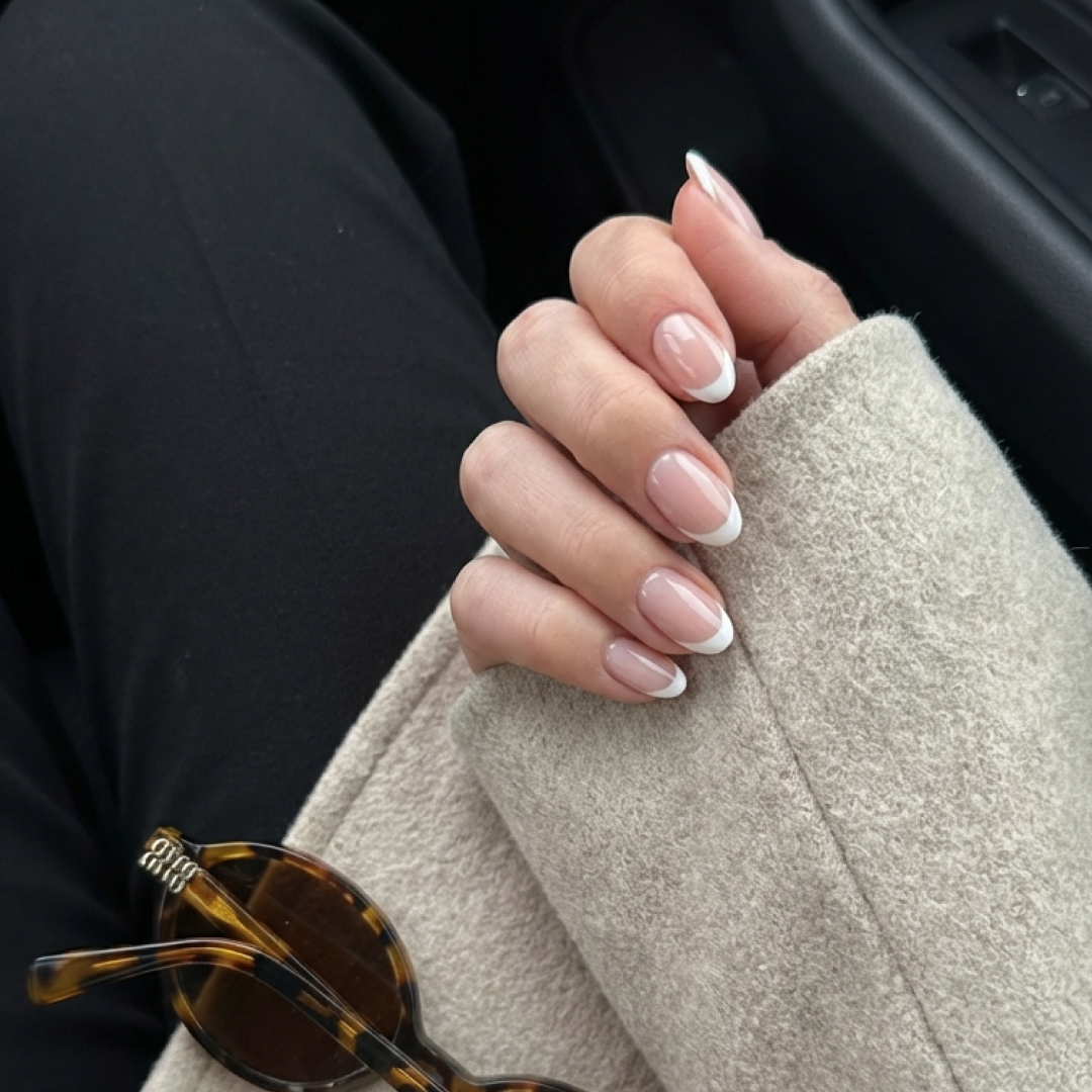 French nails done with gel polish at home — white smile line on a natural base
