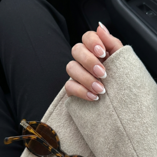 French nails done with gel polish at home — white smile line on a natural base